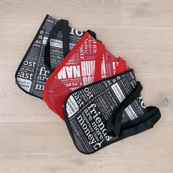 Set of three small Lululemon shopping bags